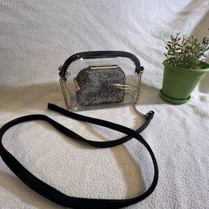 Steve Madden Black and Silver Crossbody Bag with Modern Design